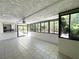 Bright sun room featuring tile flooring, abundant windows and access to the outdoors at 2480 Domingo St, Las Vegas, NV 89121