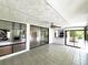 Bright sun room featuring tile flooring, abundant windows and access to the outdoors at 2480 Domingo St, Las Vegas, NV 89121