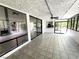 Sunroom featuring tiled floors and multiple windows at 2480 Domingo St, Las Vegas, NV 89121