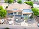 Aerial view of home's spacious backyard with decorative rocks and desert landscaping at 2540 Faiss Dr, Las Vegas, NV 89134