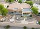 Aerial view showcases a spacious backyard with decorative stone features and desert landscaping at 2540 Faiss Dr, Las Vegas, NV 89134