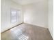 Bright bedroom with carpet flooring and a large window with shutters at 2540 Faiss Dr, Las Vegas, NV 89134