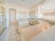 Well-lit kitchen with modern appliances, center island, and ample counter space at 2540 Faiss Dr, Las Vegas, NV 89134