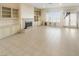 Bright living room with fireplace, neutral tones, and built in cabinets at 2540 Faiss Dr, Las Vegas, NV 89134