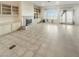 Open-concept living room with fireplace, built-in cabinets, and glass doors for natural light at 2540 Faiss Dr, Las Vegas, NV 89134