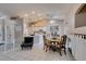 Open concept: dining area with kitchen view and fireplace at 2595 Fort Lauderdale Dr, Las Vegas, NV 89156