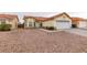 Charming single-story home with a well-maintained lawn, desert landscaping, and a two-car garage at 2595 Fort Lauderdale Dr, Las Vegas, NV 89156