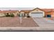 Charming single-story home with a well-maintained lawn, desert landscaping, and a two-car garage at 2595 Fort Lauderdale Dr, Las Vegas, NV 89156