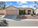 Charming single-story home featuring a two-car garage and well-maintained landscaping in a peaceful neighborhood at 2605 Lotus Hill Dr, Las Vegas, NV 89134