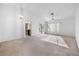 Spacious living room with vaulted ceilings and ample natural light, perfect for entertaining and relaxation at 2605 Lotus Hill Dr, Las Vegas, NV 89134