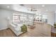 Large living room with a white sofa and view of the kitchen at 2713 Beachside Ct, Las Vegas, NV 89117