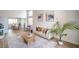 Bright living room with high ceilings, modern decor, and an open view of the dining area at 2713 Beachside Ct, Las Vegas, NV 89117