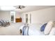 Bright main bedroom featuring a dresser, walk-in closet, and plush carpet at 2713 Beachside Ct, Las Vegas, NV 89117