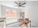 Bright home office with desk and shelving at 2713 Beachside Ct, Las Vegas, NV 89117