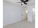 Bedroom with ceiling fan, neutral carpet and white walls creating a relaxing atmosphere at 3151 Soaring Gulls Dr # 1053, Las Vegas, NV 89128