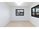 Spacious bedroom with light wood flooring, fresh paint, and modern windows at 3151 Soaring Gulls Dr # 1053, Las Vegas, NV 89128