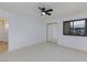 Spacious bedroom features neutral carpet, closet and window for natural light at 3151 Soaring Gulls Dr # 1053, Las Vegas, NV 89128