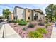 Attractive condo building with colorful landscaping and exterior features at 3151 Soaring Gulls Dr # 1053, Las Vegas, NV 89128