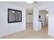 Bright living room boasts wood floors, black-trimmed windows, and an open floor plan at 3151 Soaring Gulls Dr # 1053, Las Vegas, NV 89128