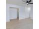 Open floor plan with wood-look floors and bright white walls at 3151 Soaring Gulls Dr # 1053, Las Vegas, NV 89128