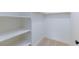 This walk-in closet is bright and organized with built in shelving at 3151 Soaring Gulls Dr # 1053, Las Vegas, NV 89128