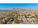 Overview of a quiet suburban neighborhood with mountain views in the distance at 3425 Creek River Dr, Las Vegas, NV 89129