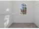 Empty walk-in closet with carpet and shelving at 3425 Creek River Dr, Las Vegas, NV 89129