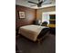 Bedroom with ceiling fan, blind-covered window, and space for storage at 3425 E Russell Rd # 161, Las Vegas, NV 89120