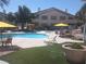Resort style pool area featuring lounge seating and dining table areas for entertaining guests at 3425 E Russell Rd # 161, Las Vegas, NV 89120