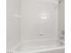 Bathtub featuring clean white tile and chrome fixtures, perfect for relaxation at 3608 Pintadas St # 204, Las Vegas, NV 89108
