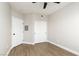 Bright bedroom with wood-look flooring, closet, and neutral walls, creating a comfortable living space at 3608 Pintadas St # 204, Las Vegas, NV 89108
