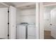 Convenient laundry room area equipped with a washer and dryer, maximizing space at 3608 Pintadas St # 204, Las Vegas, NV 89108