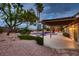 Inviting outdoor space with a covered patio, pool and mature landscaping perfect for entertaining guests at 3619 Bixbee Ct, Las Vegas, NV 89129