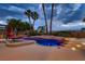 Resort-style backyard with a large swimming pool, spa, and lush landscaping, perfect for summer fun at 3619 Bixbee Ct, Las Vegas, NV 89129