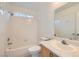 A bright bathroom features a shower-tub combo and a modern vanity at 3619 Bixbee Ct, Las Vegas, NV 89129