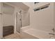 Bright bathroom features a glass-enclosed shower and separate soaking tub at 3619 Bixbee Ct, Las Vegas, NV 89129