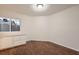 The bedroom features hardwood floors, a window, and built-in storage at 3619 Bixbee Ct, Las Vegas, NV 89129