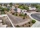 Home exterior with solar panels, desert landscaping, and a circular driveway at 3619 Bixbee Ct, Las Vegas, NV 89129