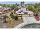 Inviting home featuring a two-car garage, desert landscaping, and solar panels for energy efficiency at 3619 Bixbee Ct, Las Vegas, NV 89129