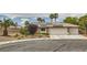 Charming single-story home with desert landscaping, three-car garage and solar panels at 3619 Bixbee Ct, Las Vegas, NV 89129