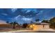 Charming single-story home featuring a well-manicured lawn, mature palm trees, and a two-car garage at 3619 Bixbee Ct, Las Vegas, NV 89129
