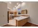Charming kitchen featuring wood cabinets, stainless steel appliances, and an eat-in bar area at 3619 Bixbee Ct, Las Vegas, NV 89129