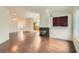 Spacious living room featuring hardwood floors, fireplace, and abundant natural light at 3619 Bixbee Ct, Las Vegas, NV 89129
