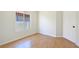 Bright bedroom with wood-look flooring and a window offering natural light at 3808 Lilac Haze St, Las Vegas, NV 89147
