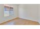 Bright bedroom with wood-look flooring and a window offering natural light at 3808 Lilac Haze St, Las Vegas, NV 89147