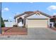 Charming single-story home with well-maintained landscaping and a two-car garage at 3808 Lilac Haze St, Las Vegas, NV 89147