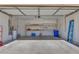Spacious two car garage featuring ample shelving and plenty of room for storage at 3808 Lilac Haze St, Las Vegas, NV 89147