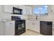 Well-equipped kitchen with updated appliances and sleek countertops, offering functionality and style at 3808 Lilac Haze St, Las Vegas, NV 89147