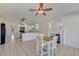 Modern eat-in kitchen with stylish lighting, open layout, and a cozy fireplace, perfect for modern living at 3808 Lilac Haze St, Las Vegas, NV 89147