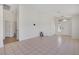 Bright living room featuring tile floors and high ceilings, perfect for entertaining and comfortable living at 3808 Lilac Haze St, Las Vegas, NV 89147